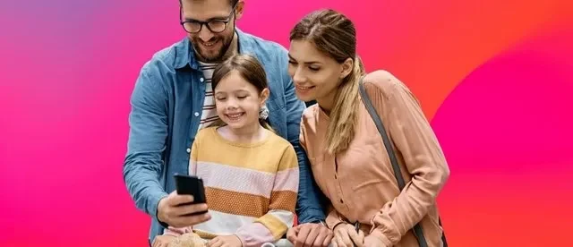 family looking at the phone