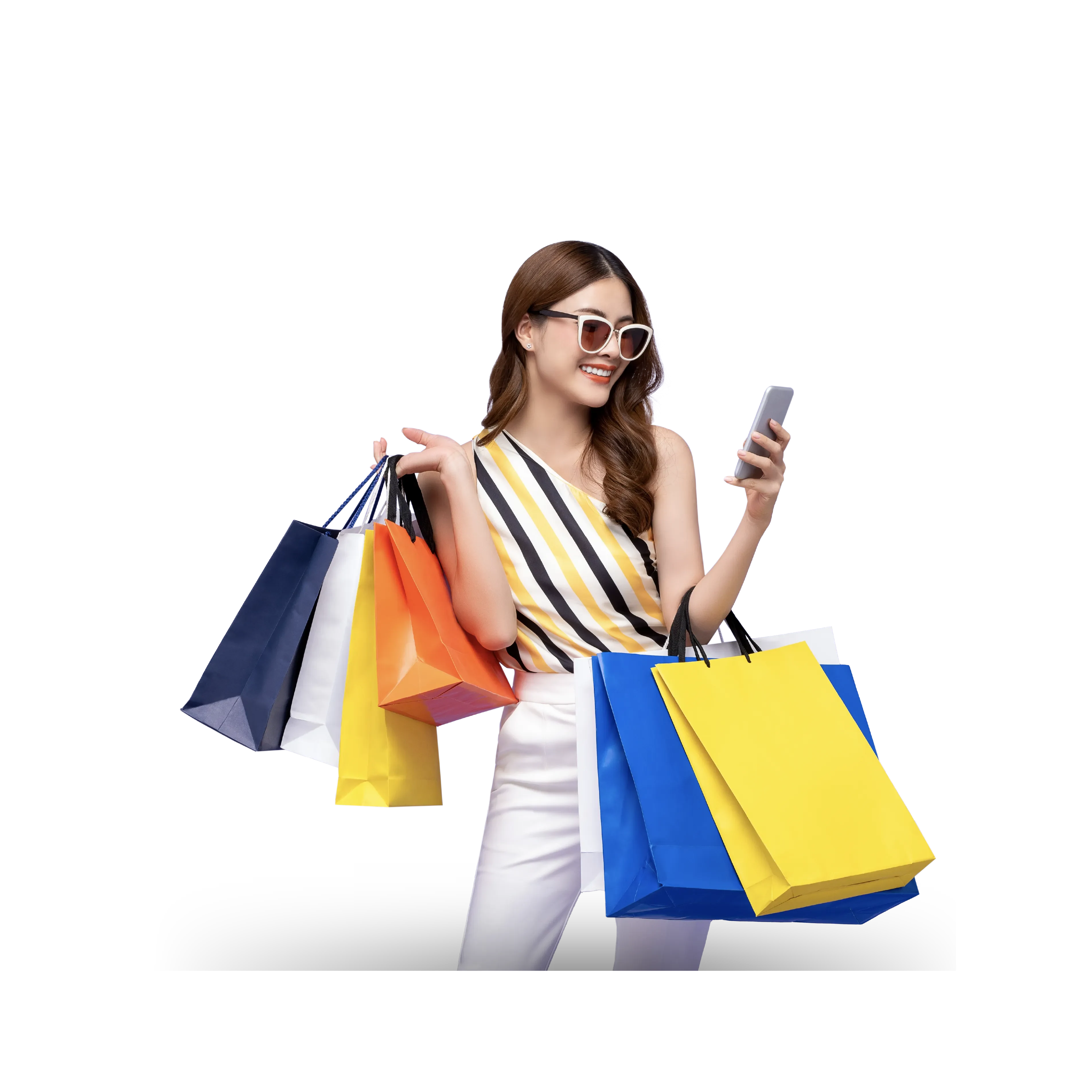 Women with colourful shopping bags looking at her phone